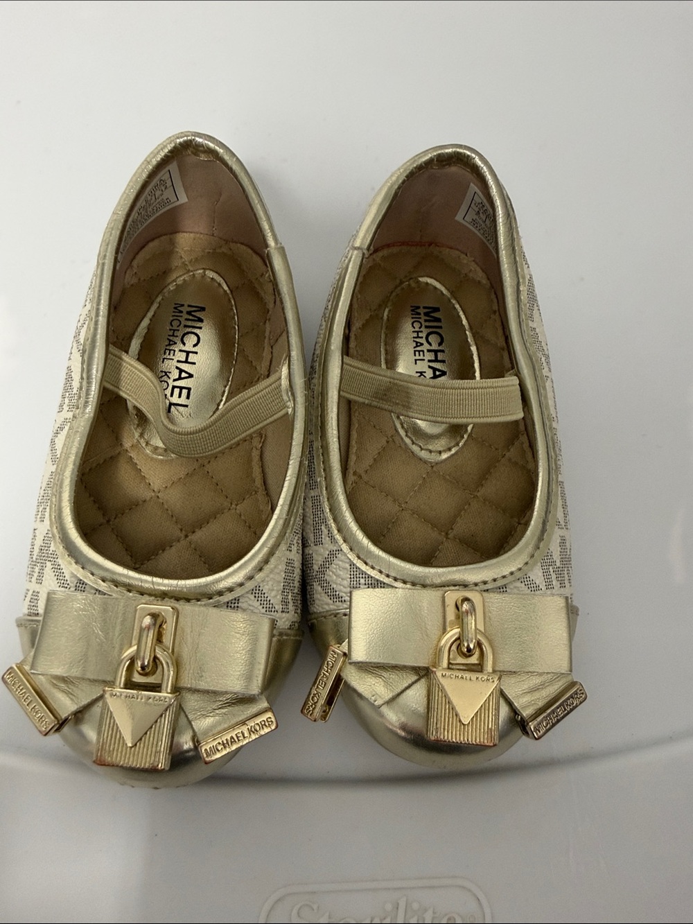 Michael Kors Little Girls Metallic Gold Logo Bow Flats